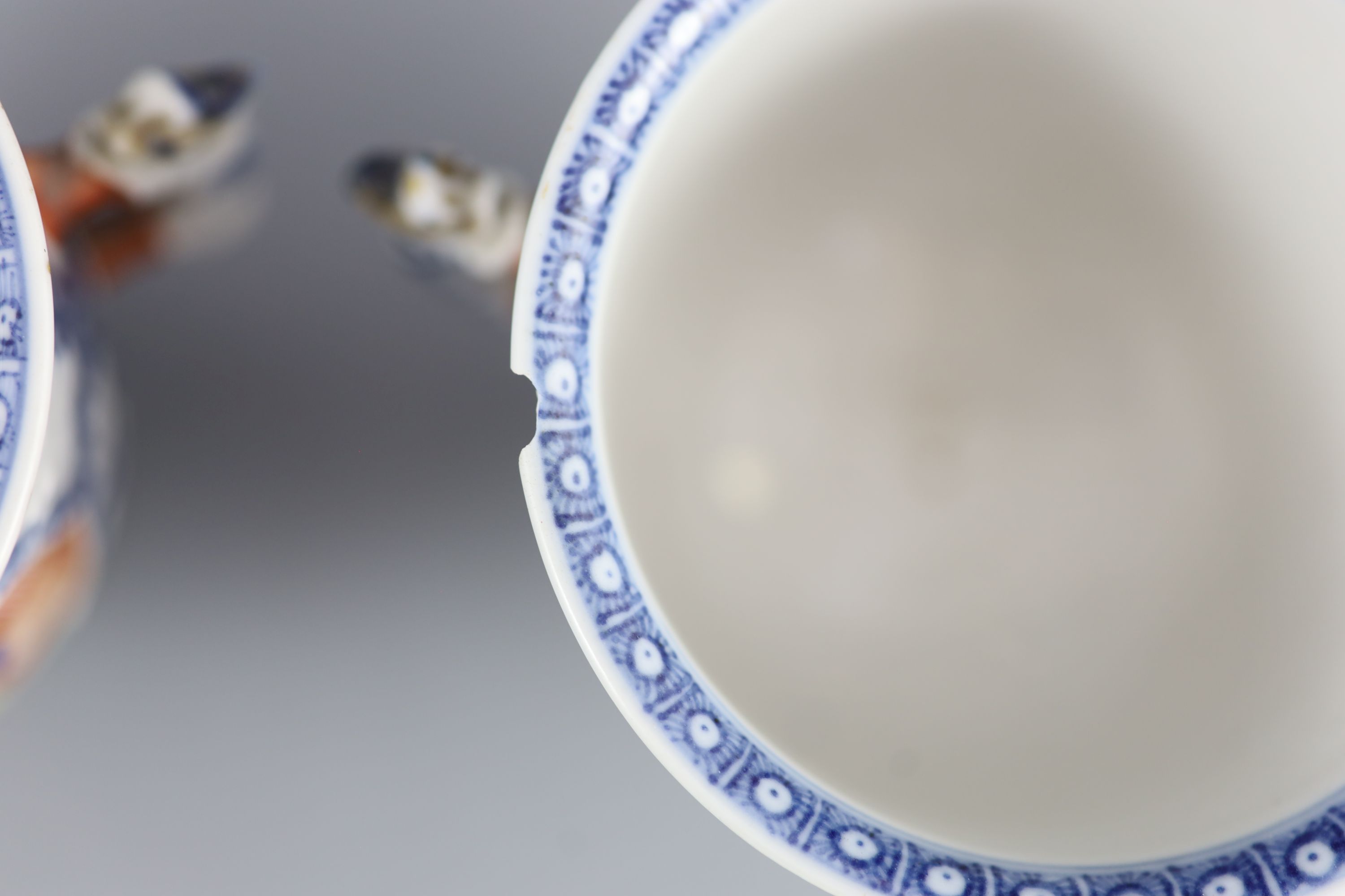 A pair of Chinese famille rose two handled cups, Qianlong period, 9.5cm high, slight faults